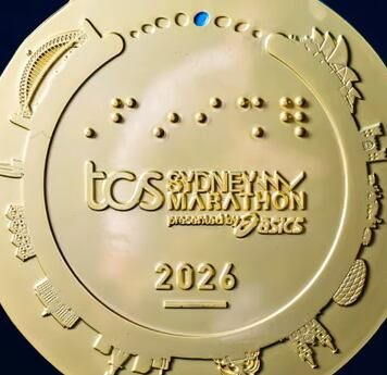 El insólito error en la medalla del Maratón de Sídney: incluyeron un estadio de Alemania